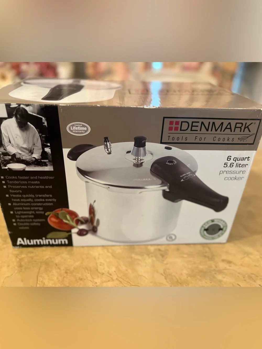 New - 6 Quart Stainless Steel Pressure Cooker with Black Handles